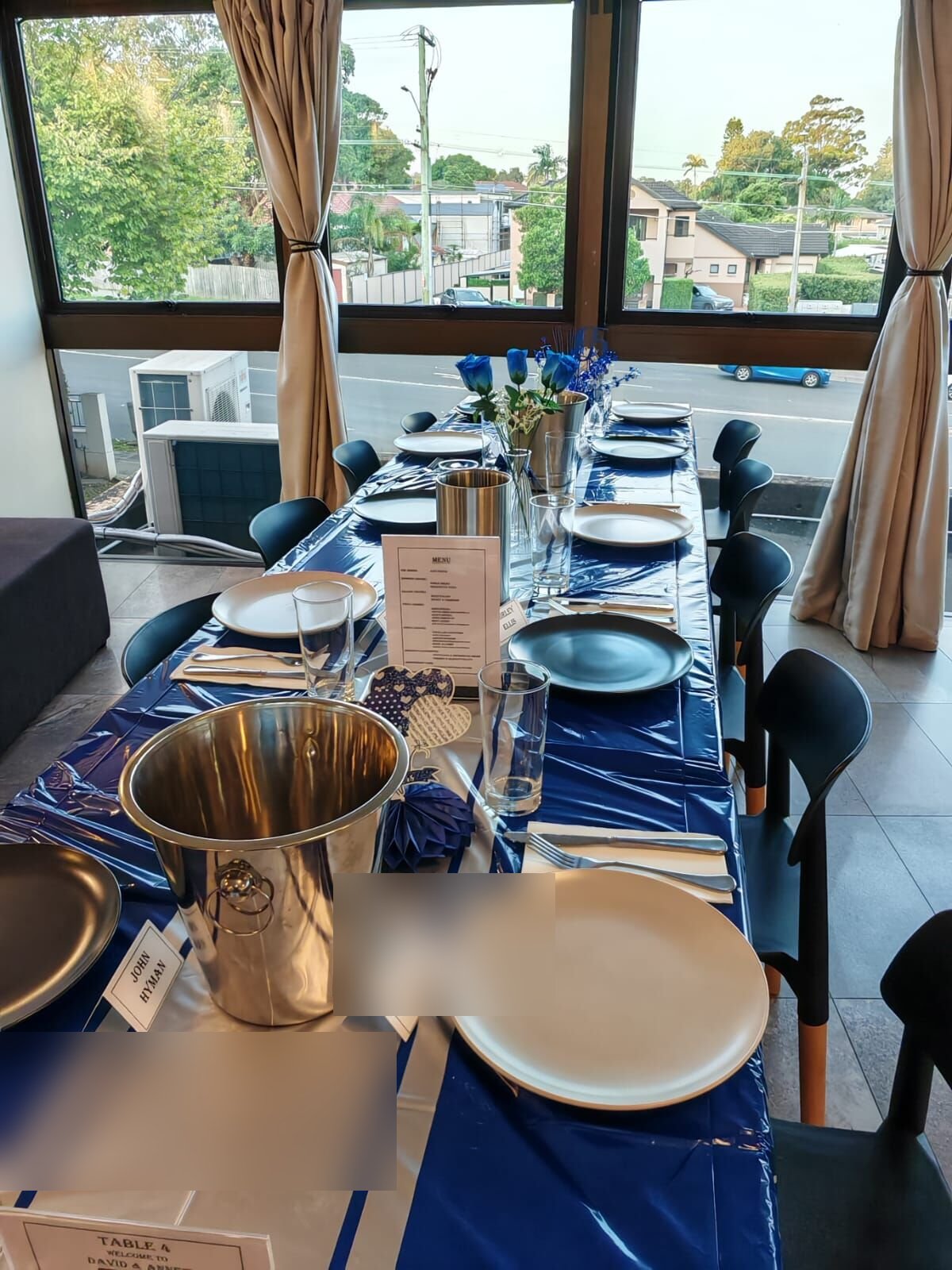 Sam's Italian Restaurant function room set up for a celebration with long tables