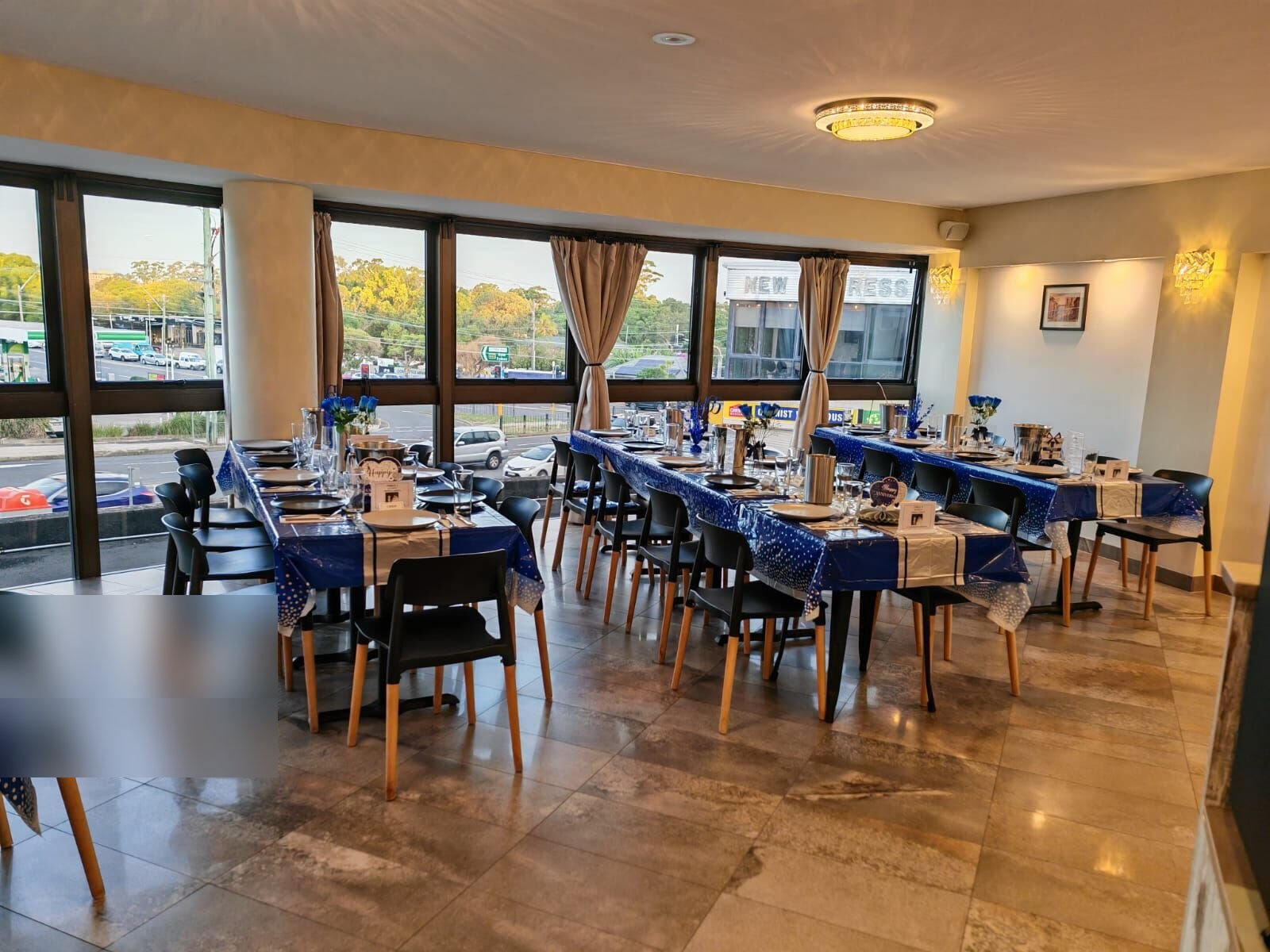 Wide view of the function room set up for a celebration
